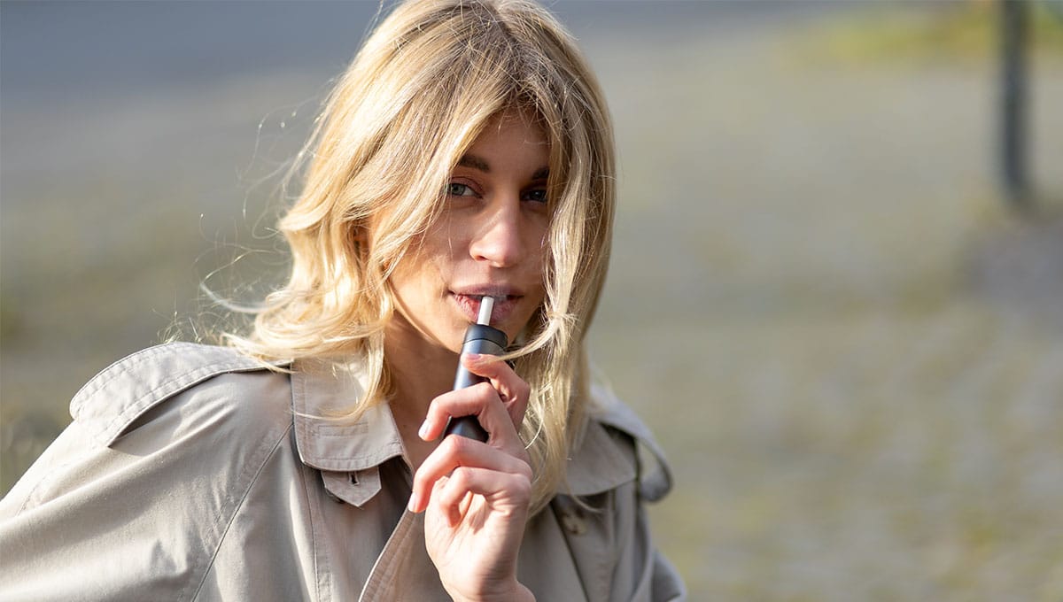 a woman smoking a cigarette