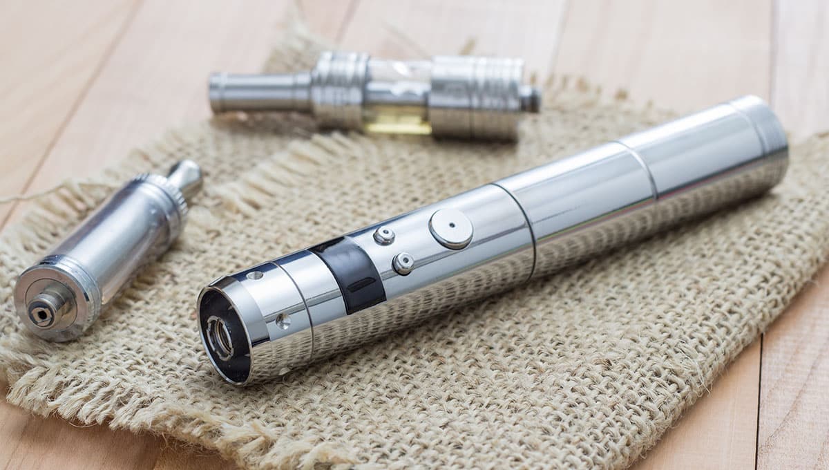 a silver and black electronic cigarette