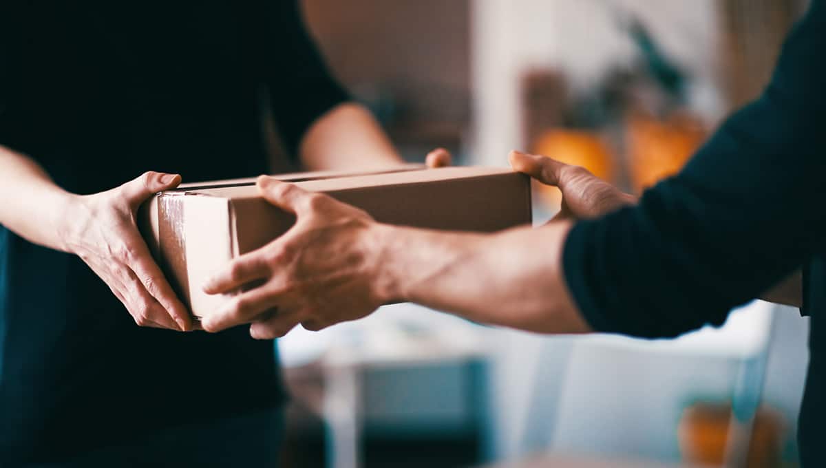 a person holding a box